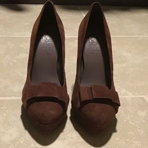 High heeled brown suede shoes